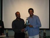 2008 MCA Banquet - Keith Deonaraine, Cosmos Captain receives Twenty20 Winner's Trophy from League Chairman, Joe Lovelace