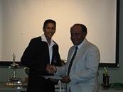 2008 MCA Banquet - Trevor Manoosingh receives High Performance Award from President, J. Lovelace