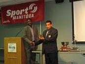 2008 MCA Banquet - Joe Marrast receives plaque from Ron Dipchand, Executive Director